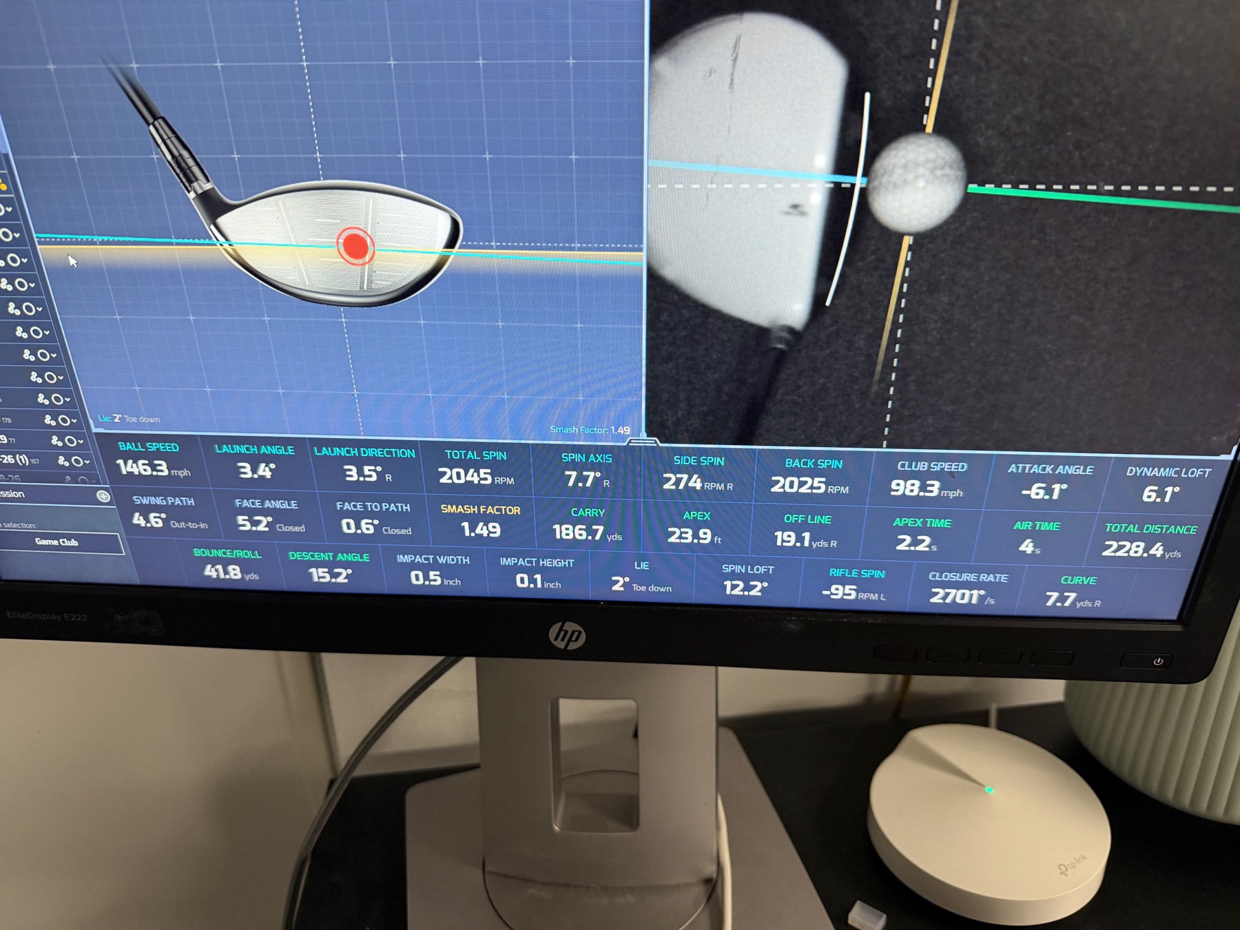 Launch monitor shot data and impact analysis displayed on screen at Dev's Golf Sim