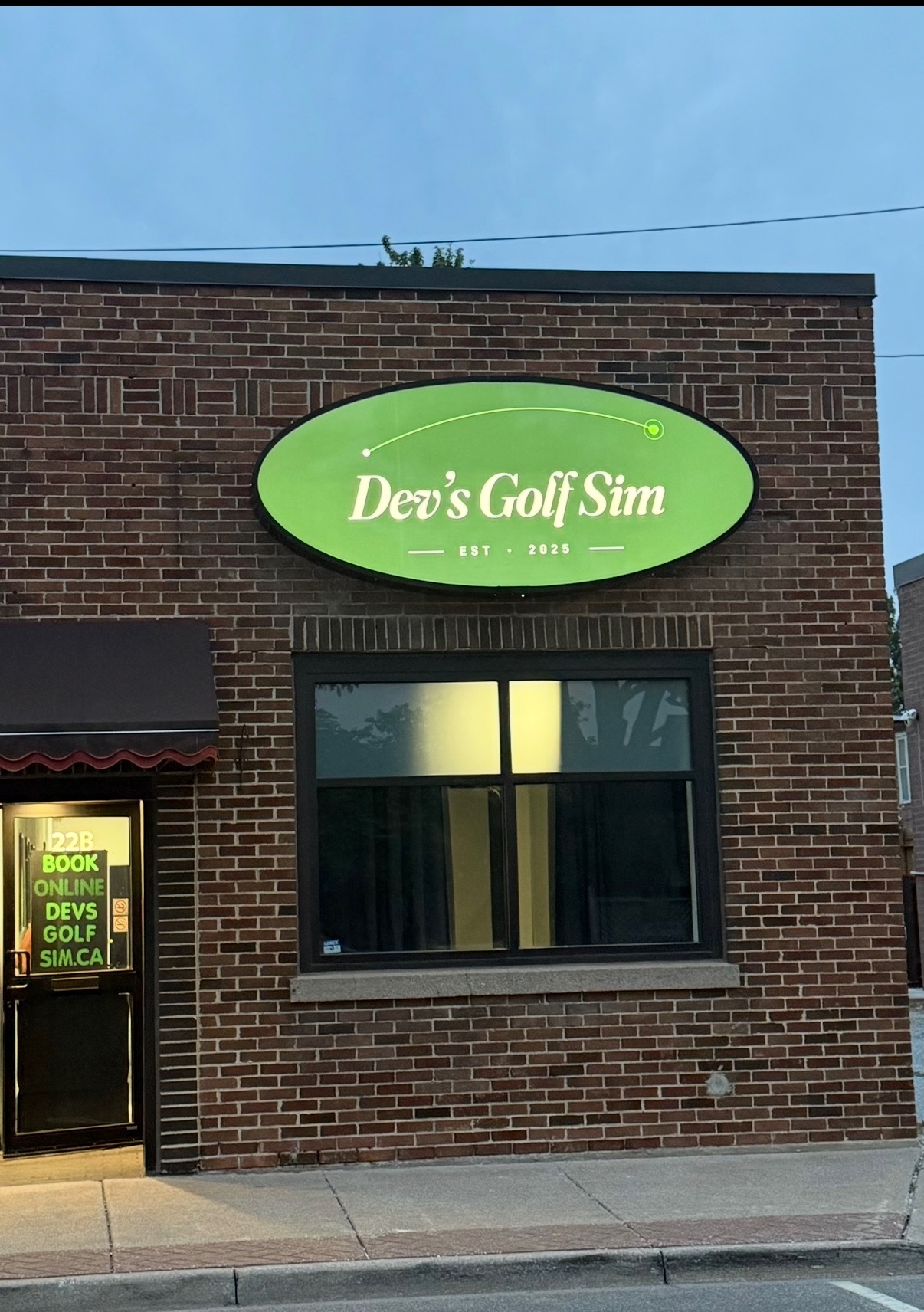 Dev's Golf Sim storefront at 22b Centre Street in Essex, Ontario